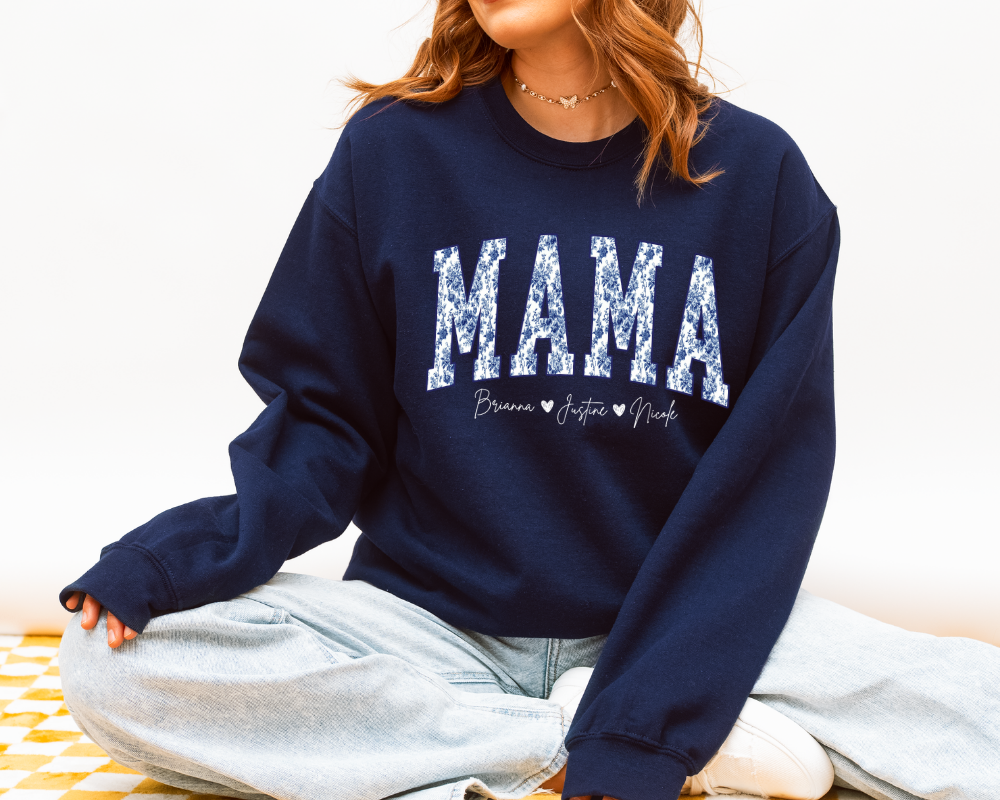 Personalized mama sweatshirt with kids names in navy styled with jeans
