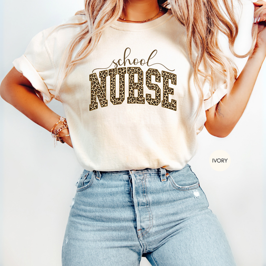 School nurse leopard print varsity shirt in ivory color styled with jeans