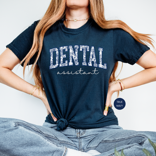 Dental Assistant navy shirt with collegiate font design worn by woman, cute dental office outfit