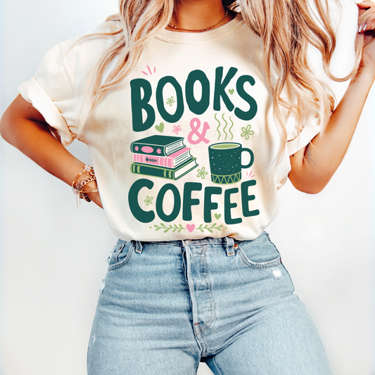 Books & Coffee graphic tee featuring a stack of books, a coffee mug, and modern typography on a Comfort Colors Ivory t-shirt.