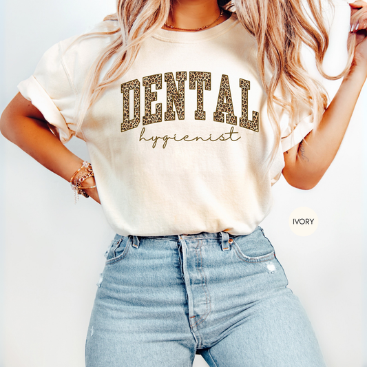 Woman wearing ivory Dental Hygienist leopard print shirt styled with jeans