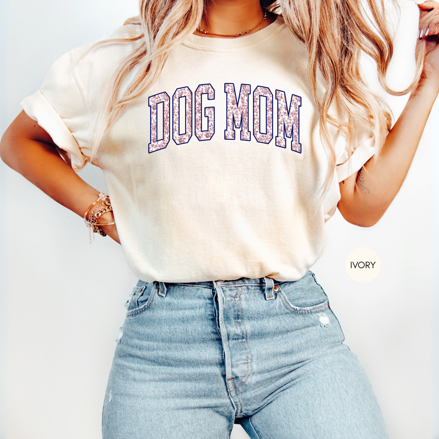 Ivory Dog Mom floral varsity shirt styled with jeans – vintage dog lover graphic tee
