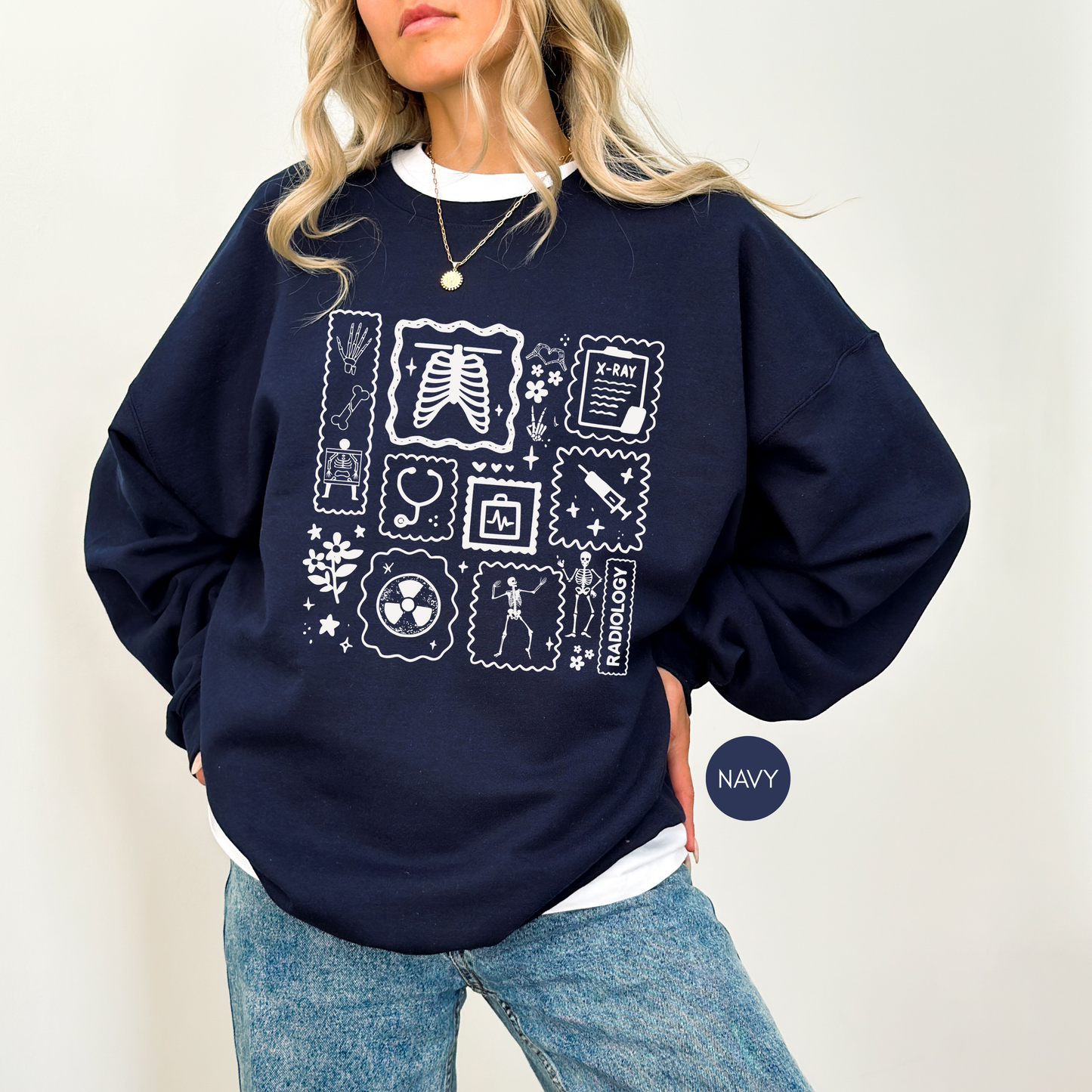 Radiology sweatshirt with medical imaging icons worn by radiology technologist