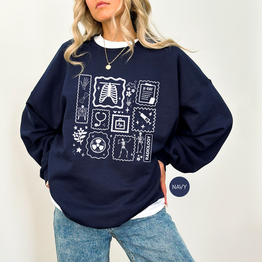 Radiology sweatshirt with medical imaging icons worn by radiology technologist