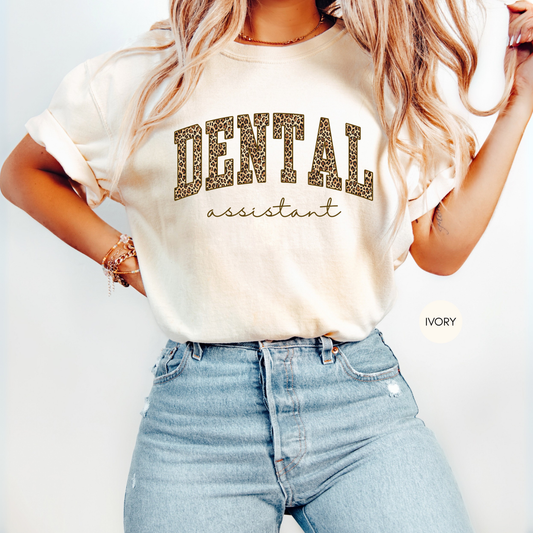 Ivory Dental Assistant leopard print graphic shirt styled with denim jeans.