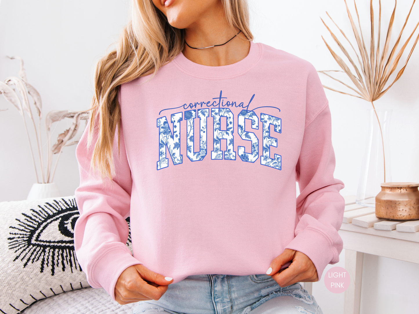 Correctional Nurse Sweatshirt – Navy Blue Floral Design