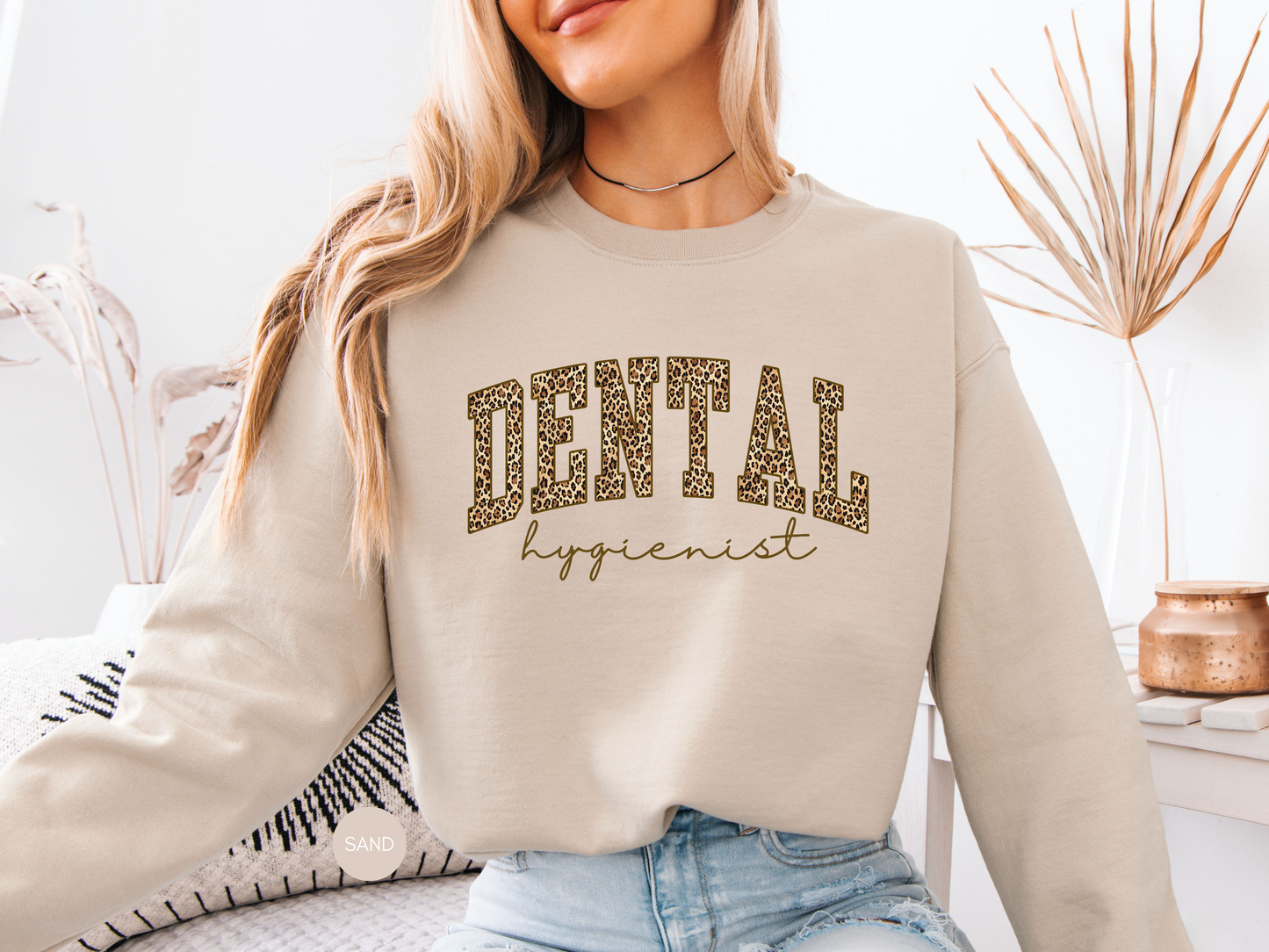 Dental hygienist leopard sweatshirt worn casually with jeans
