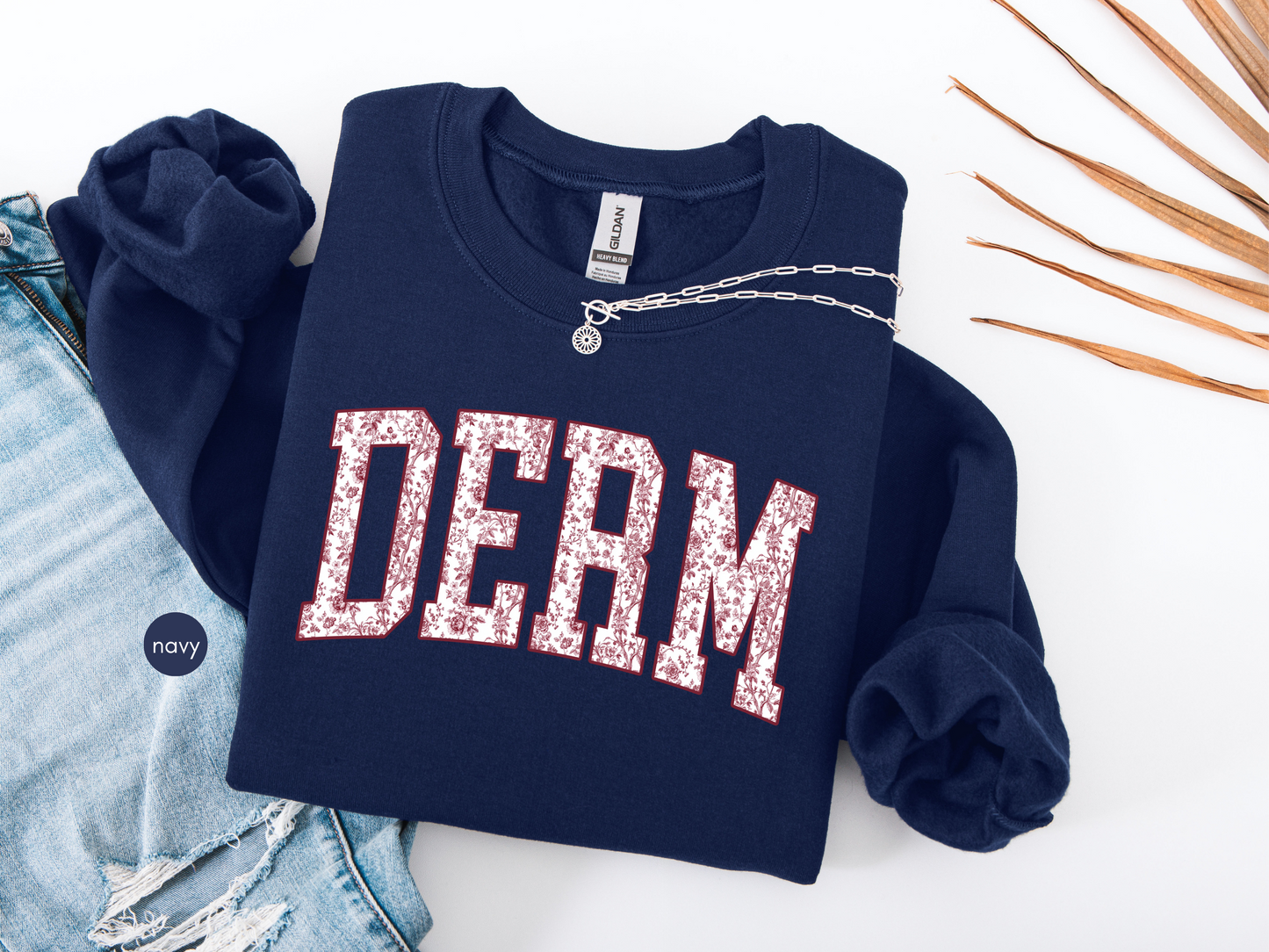 DERM floral sweatshirt for dermatology nurse, navy crewneck with floral varsity lettering