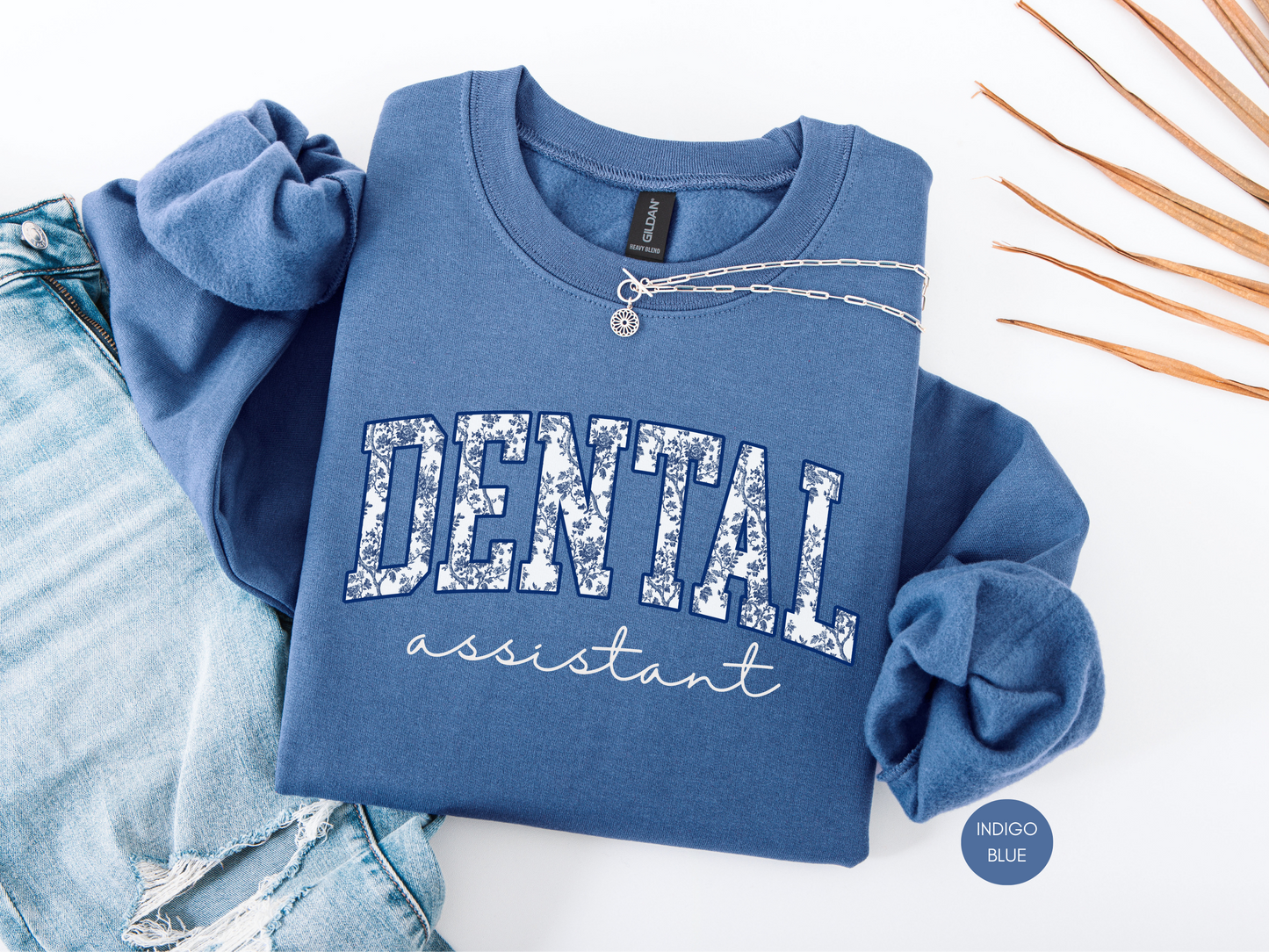 Indigo blue dental assistant sweatshirt with blue toile collegiate lettering, cozy professional apparel for dental assistants